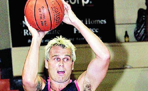 Shane Heal holds onto the ball during his basketball playing days. Shane Heal holds onto the ball during his basketball playing days.